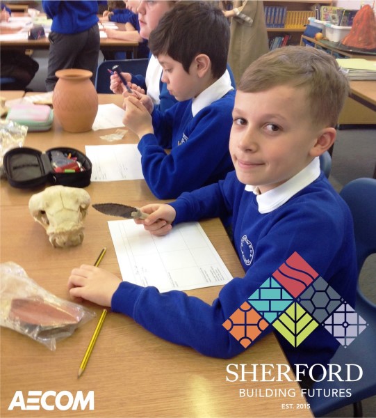 Hands on history lesson: Sherford Archaeologists visit Plymouth Primary School